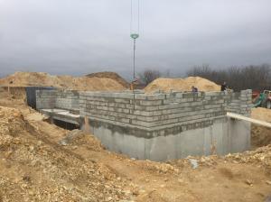 Elévation des murs du rez-de-chaussée en agglo